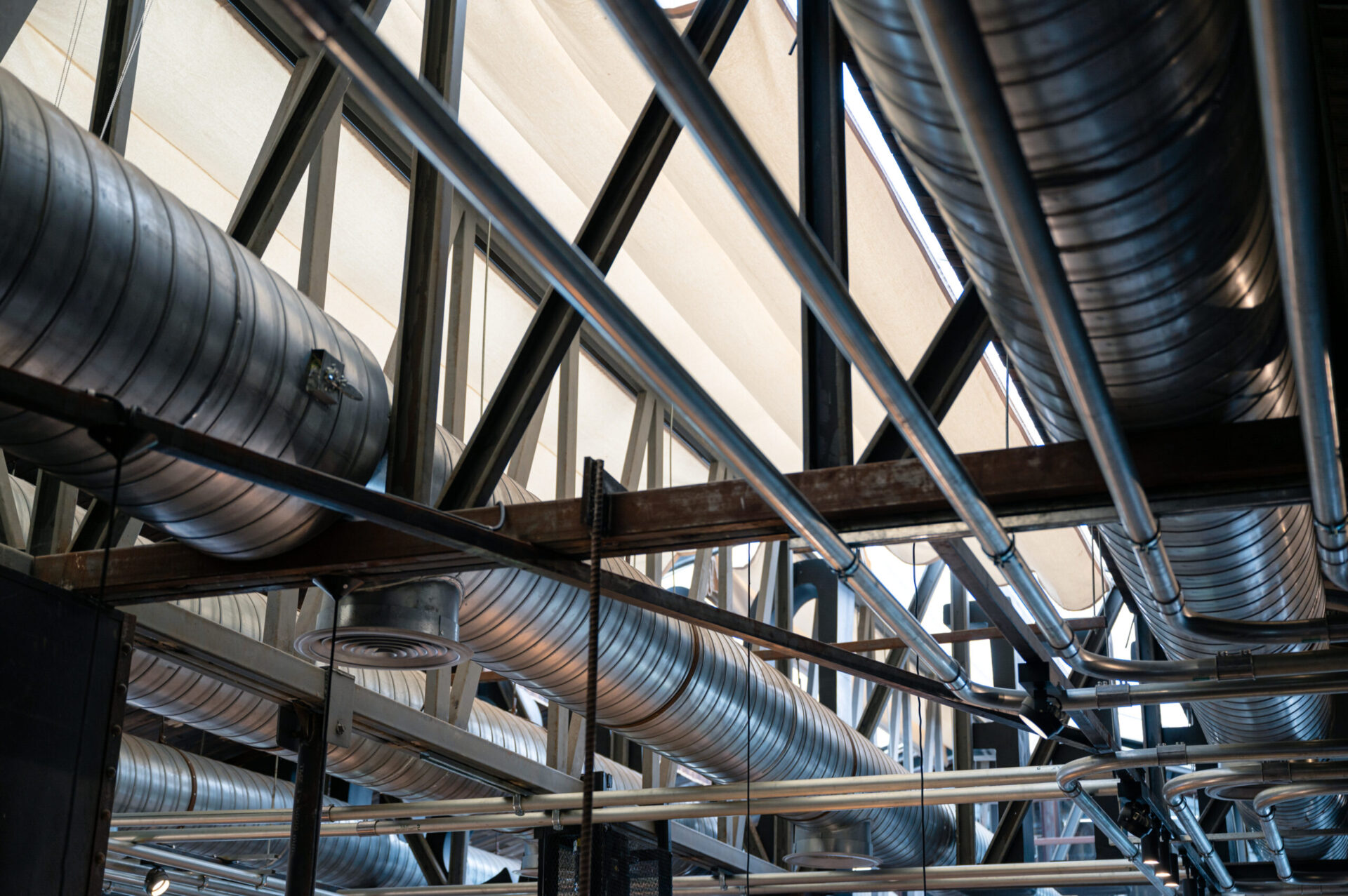ceiling structure with steel ventilation pipe scaled